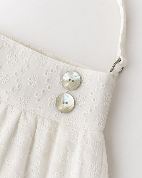 Coquette eyelet shell button bag in white by Angel Ruche, photo 5