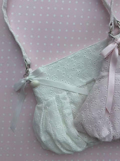 Coquette eyelet shell button bag in white by Angel Ruche, photo 7